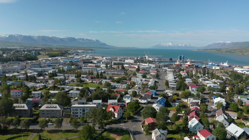 Birds eye view of Reykjavik, capital and largest city in Iceland, on the shore of Faxafloi Bay. Aerial view of the old harbor near the city centre, mainly used by fishermen and cruise ship