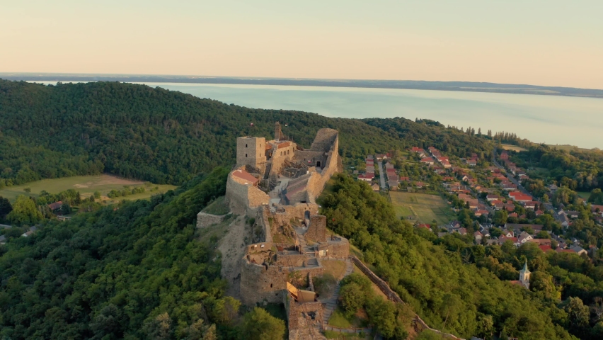 Drone aerial view of castle Szigliget medieval fortress on a hill in Balaton Uplands