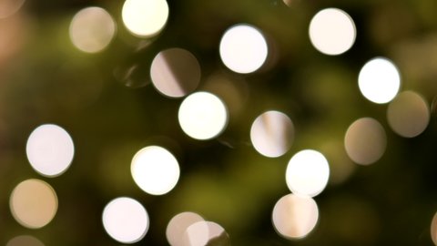 Fairy light on a Christmas tree festive blurred bokeh abstract background