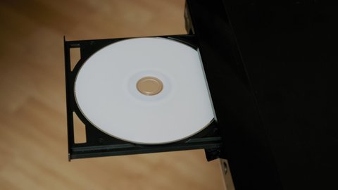 Shot Eject Disc to DVD player. Eject Compact Disc From The DVD, CD Player.
