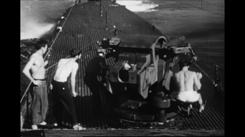 1940s: Ship explodes and sinks. Survivors in lifeboat. Sailors pull men to top of submarine. Men restrain prisoners.