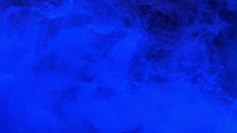 Blue ink acrylic paint mixing in water, swirling softly underwater. Colored acrylic cloud of paint in aquarium. Slow motion abstract smoke explosion animation. Beautiful art background