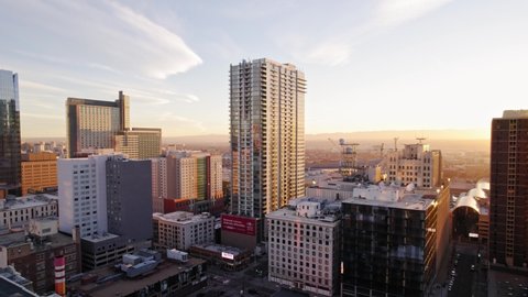 Denver , Colorado , United States - 12 14 2021: Spire Condos Condominium Complex in Downtown Denver, Colorado During Sunset.