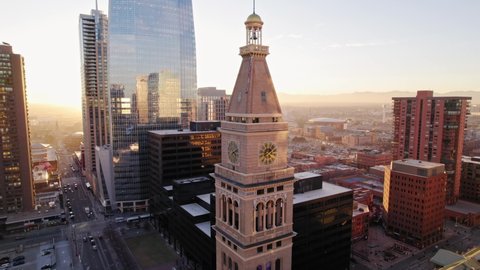 Denver , Colorado , United States - 12 14 2021: Lannies Clocktower In Downtown Denver Colorado During Golden Hour Sunset.