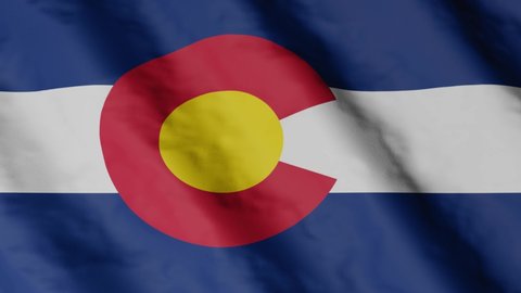State flag of Colorado waving in the wind. Video footage.