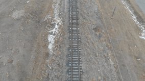 abandoned railway across the snowy mountains - Powered by Shutterstock - Get 15% off with code: PIKWIZARD15