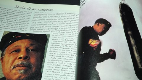 Rome, Italy - December 25, 2021, detail of some images on a report dedicated to boxer Archie Moore, in the monthly magazine King, now out of print, October, 1989.