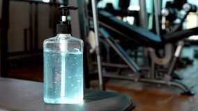 Hand sanitizer alcohol gel rub clean hands in gym. Hygiene prevention of coronavirus virus outbreak. Antiseptic, disinfection and healthcare lifestyle. Preventive measures during epidemic Covid-19 - Powered by Shutterstock - Get 15% off with code: PIKWIZARD15