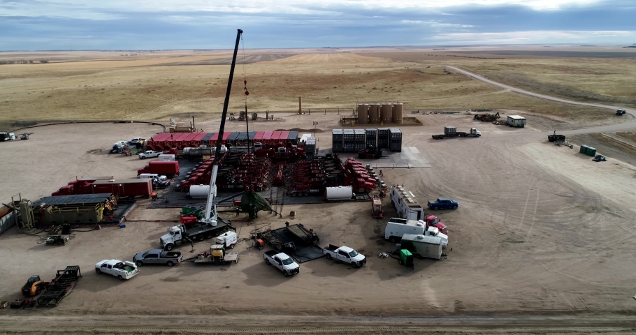 A tight orbit of fracking operations on the plains of Eastern Colorado 2021. Drone 4K DCI. High quality footage. | Shutterstock HD Video #1084497403