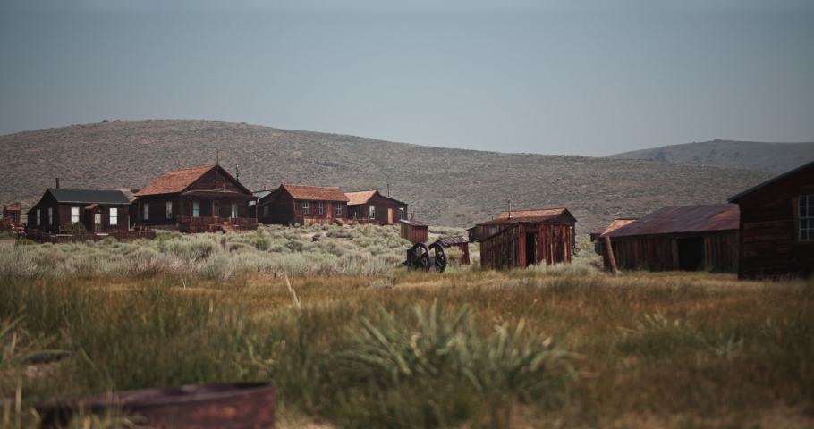 Old abandoned ghost town buildings in the hills of the gold rush area in California