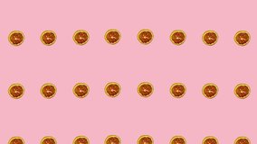 Colorful pattern of dried grapefruit slices on pink background. Seamless pattern with dried grapefruit chips. Realistic animation. 4K video motion