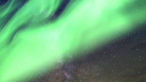 Milky way. Northern lights. Cosmos, twinkling stars, aurora. Time lapse background. Night sky. 25 fps 