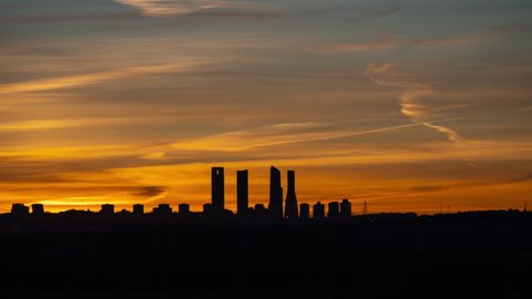 Timelapse of colourful sunset of Madrid skyline