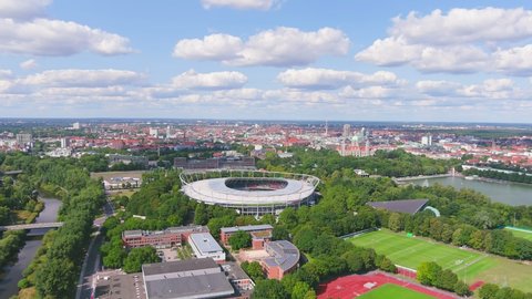 HANOVER, GERMANY, EUROPE - CIRCA 2020: Aerial view of city in Germany, Niedersachsenstadion stadium (HDI Arena), famous soccer stadium and home of German Bundesliga football club Hannover 96.
