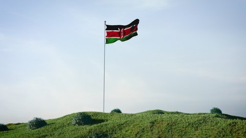 Kenya, kenyan flag waving in the wind on a beautiful landscape. Blue sky. 4K HD. Stunning image.