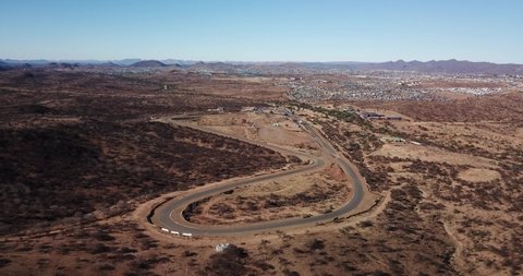 Windhoek, Namibia, 10.23.21: 4K aerial drone video of Tony Rust racing track near Otjomuise township on hot sunny day in southern Africa