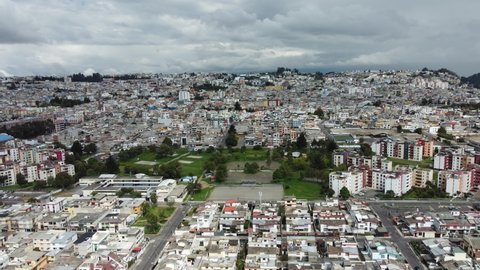 Aerial shot of a neighborhood called La Luz where you can see its main park Quito Ecuador northern sector in 4k ideal for advertising, tourism, academic, sports and urban video projects.