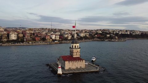 Drone rotation shot of Maiden's tower, also known as Leander's tower, located in Bosphorus strait separating the continents of Europe and Asia, city of Istanbul, Turkey.