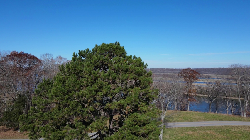 Ascending Reveal Shot Of Cumberland River Near Fort Donelson In Dover, Tennessee On A Sunny Day In Autumn. aerial drone