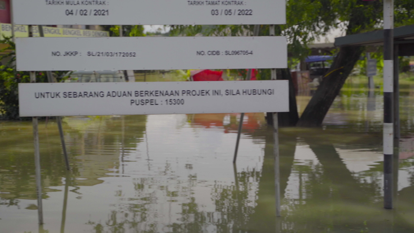 SELANGOR, MALAYSIA - DEC 18th, 2021 : FOOTAGE OF MALAYSIA AFTERMATH BIGGEST FLOOD COVERING MAJOR AREA IN SELANGOR AND KLANG VALLEY. IT SIDE IMPACT FROM THE RAI TYPHOON.