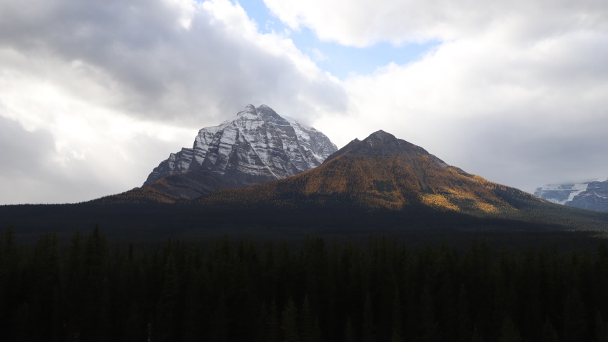 Time lapse video of Mount Temple and Little Temple during the autumn season in Lake Louise, Banff National Park Alberta Canada