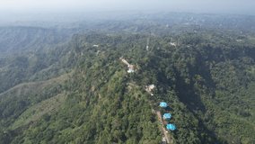 Aerial drone video of the natural beauty and the green hilly mountain area's of the southern part of Bangladesh close to the Myanmar border called Bandarban