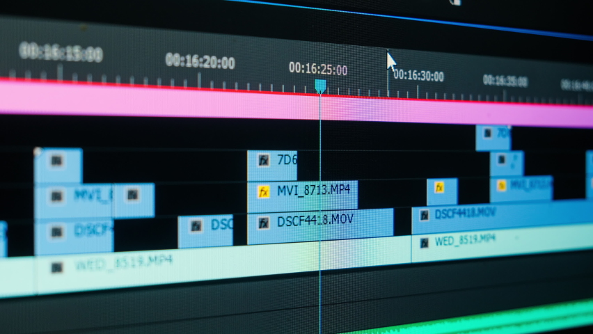 The movie editor highlights, selects, and moves footage in a timeline editing project in a computer program macro mode. time-lapse editing of a TV show, film
 | Shutterstock HD Video #1084573597