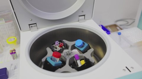 Laboratory centrifuge. Rotation of medical samples in a laboratory centrifuge. Medical centrifuge operation