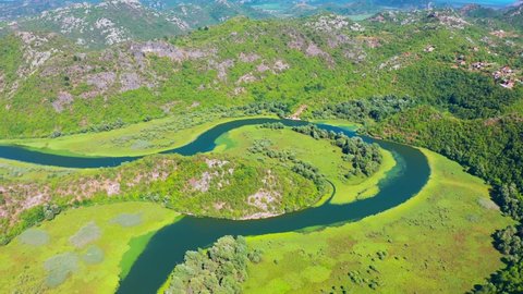 Aerial top view of River Rijeka Crnojevica in Montenegro. Skadarsko Jezero national park.
