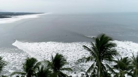 Drone view of Playa Las Flores, El Salvador. Clip from a surf trip in Playa Las Flores, El Salvador, a perfect right hand point break, slow motion.