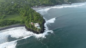 Aerial view of Playa Las Flores, El Salvador. Clip from a surf trip in Playa Las Flores, El Salvador, a perfect right hand point break, slow motion.