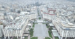 Aerial view of one of the main tourist attractions of Thessaloniki - Aristotle Square with cafes and hotels and public transport. Travel in Greece concept