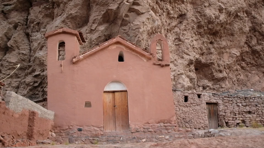 Mud made christian church in Peruvian Andes. Small catholic temple in Cusco.