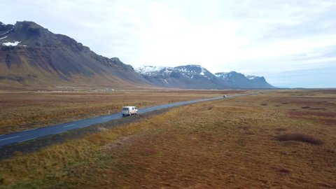 Aerial view of white van driving on road in Iceland
