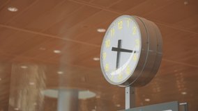 Close up view of a white clock at the airport terminal. - Powered by Shutterstock - Get 15% off with code: PIKWIZARD15