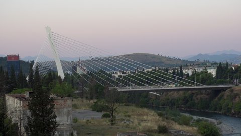 PODGORICA, MONTENEGRO - SEPTEMBER 15, 2021: Sunrise morning in Podgorica, Montenegro. Editorial, 4K. Contains binaural audio. Medium shot