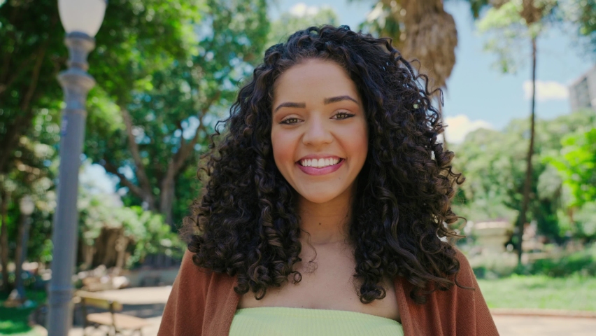 Smiling young latin woman. Joy, positive and love. Beautiful Brazilian girl. Cinematic 4K | Shutterstock HD Video #1084603405