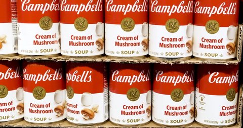 Los Angeles, CA USA December 17th, 2021 Can tins of Campbells brand cream of mushrooms in a supermarket shelf
