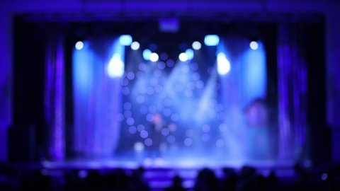 Blur light texture, background for design. Blurred theatrical and blue concert spotlights