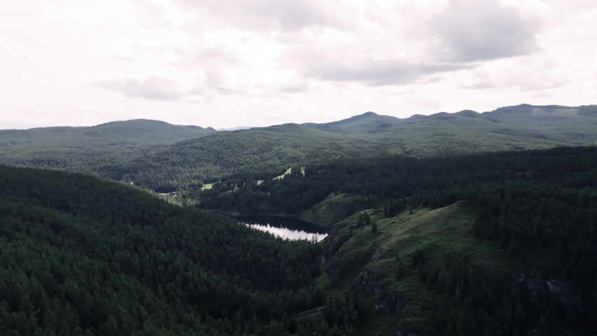 View on the lake between rocky mountains. Beautiful landscape