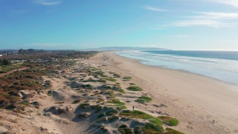 4K drone aerial shot of Pismo Beach sand dunes and Pacific Coast - California, United States of America