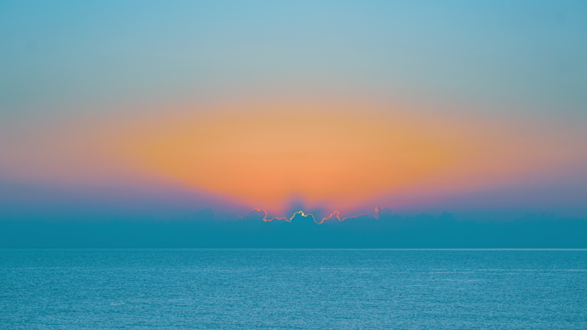 Colorful sunrise over sea and islands on a summer morning. 4K time lapse