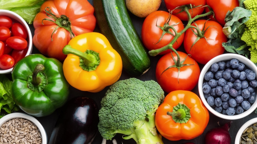 Healthy eating ingredients: fresh vegetables, fruits and superfood. Nutrition, diet, vegan food. Royalty-Free Stock Footage #1084615810