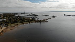 Kronstadt island with military russian naval port. Baltic sea, gulf of finland near Saint-Petersburg. Aerial drone view. Flying over. Drone is moving forward. High quality 4k footage