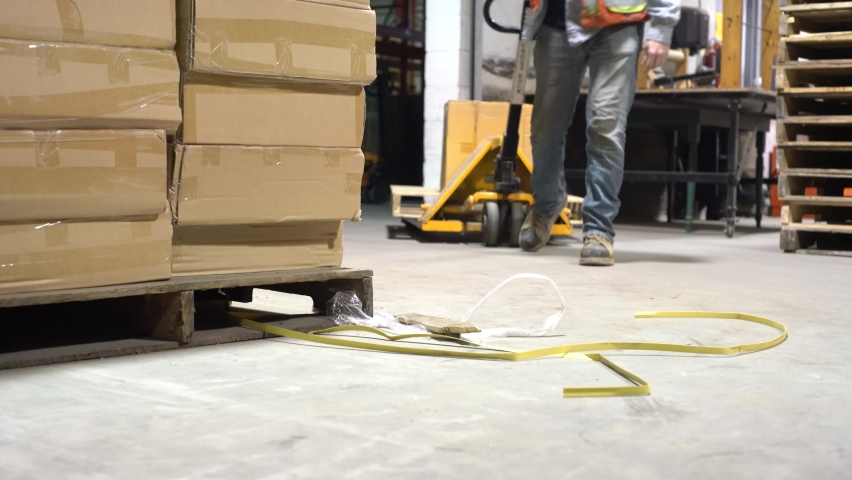 An industrial, warehouse and factory occupational safety topic. Slips, trips and falls are a major source of workplace injuries and claims. | Shutterstock HD Video #1084638943