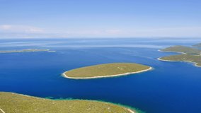 Incredible view of small Ilovik island from Losinj island. Bird's eye view. Location place Kvarner Gulf, Croatia, Europe. Cinematic drone shot. Filmed in UHD 4k video. Discover the beauty of earth.