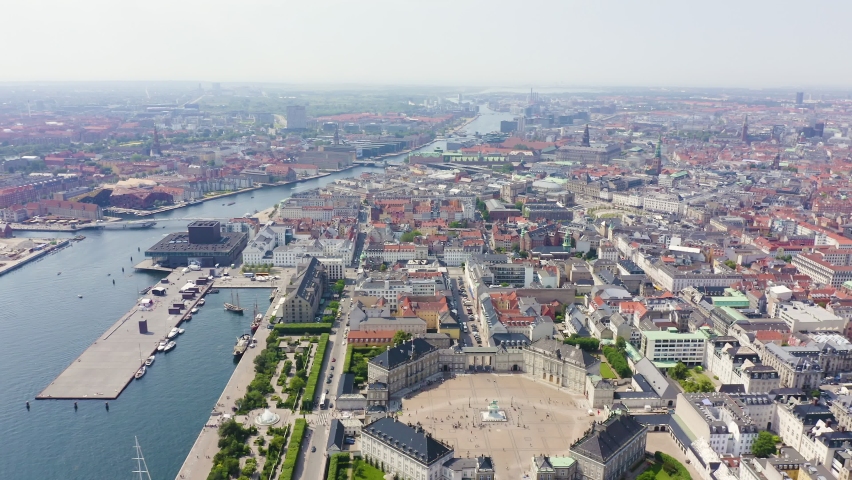 Inscription on video. Copenhagen, Denmark. General panorama of the historical part of the city. Aerial view. Flames with dark fire, Aerial View