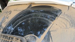 Windshield wipers cleaned dust and mud after the car was driven on a rural dirt road - Powered by Shutterstock - Get 15% off with code: PIKWIZARD15