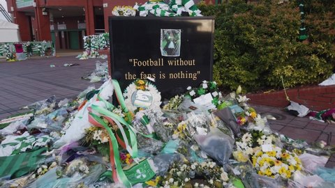 Glasgow , United Kingdom (UK) - 11 27 2021: Close-up of football fans tributes to Celtic legend, Bertie Auld. 