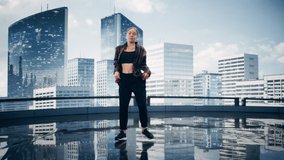 Stylish Young Professional Female Dancer Performing a Hip Hop Dance Routine in Front of Big Led Wall Screen with Modern City Skyline with Office Skyscrapers in Studio Environment.